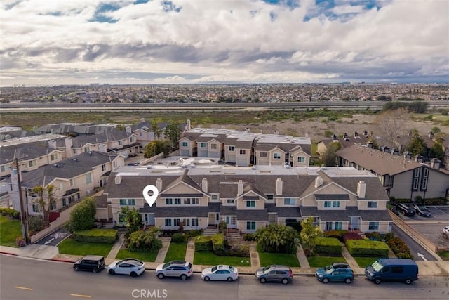 drone / aerial view with a residential view