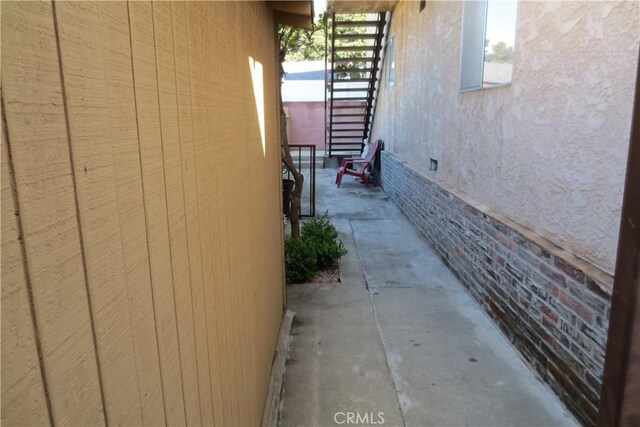 view of home's exterior featuring crawl space and stucco siding