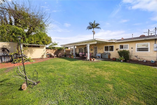 view of yard featuring a patio area and a fenced backyard