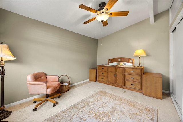 bedroom with a closet, ceiling fan, and baseboards