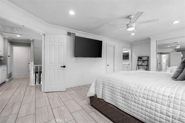 bedroom with recessed lighting, visible vents, baseboards, and crown molding