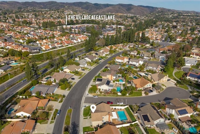 drone / aerial view with a mountain view and a residential view