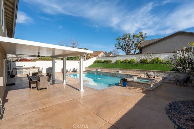 view of pool with a fenced in pool, a fenced backyard, area for grilling, an in ground hot tub, and a patio