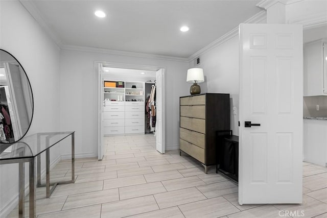 hall with visible vents, recessed lighting, and crown molding