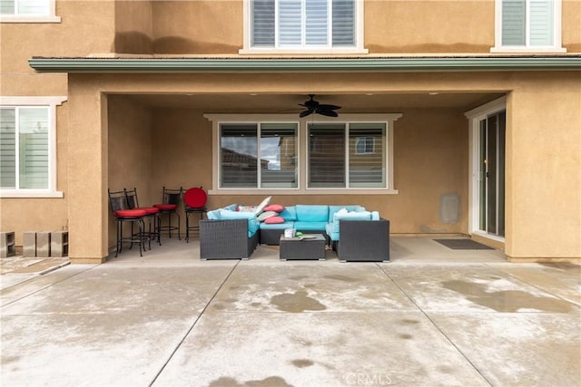 view of patio featuring outdoor lounge area and a ceiling fan