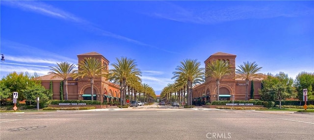 view of street featuring curbs and sidewalks