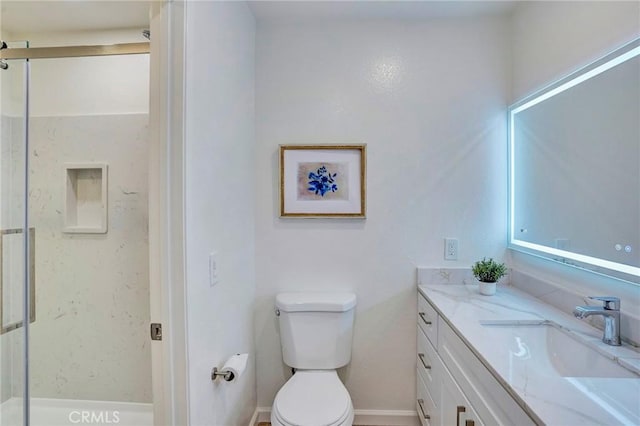 full bath with toilet, a stall shower, and vanity