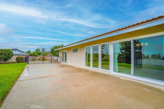 view of patio featuring fence