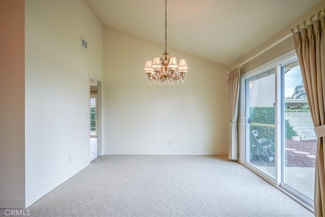 spare room featuring visible vents, baseboards, a chandelier, carpet floors, and high vaulted ceiling