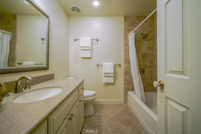 full bathroom with vanity, visible vents, tile patterned flooring, shower / bath combo with shower curtain, and toilet