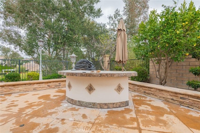 view of patio / terrace with fence