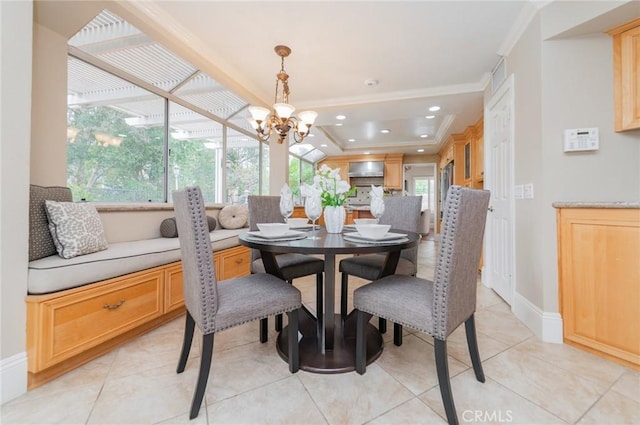 dining room with a chandelier, ornamental molding, recessed lighting, light tile patterned flooring, and a raised ceiling