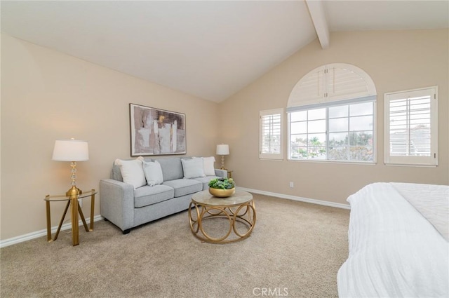 carpeted living room with lofted ceiling with beams and baseboards