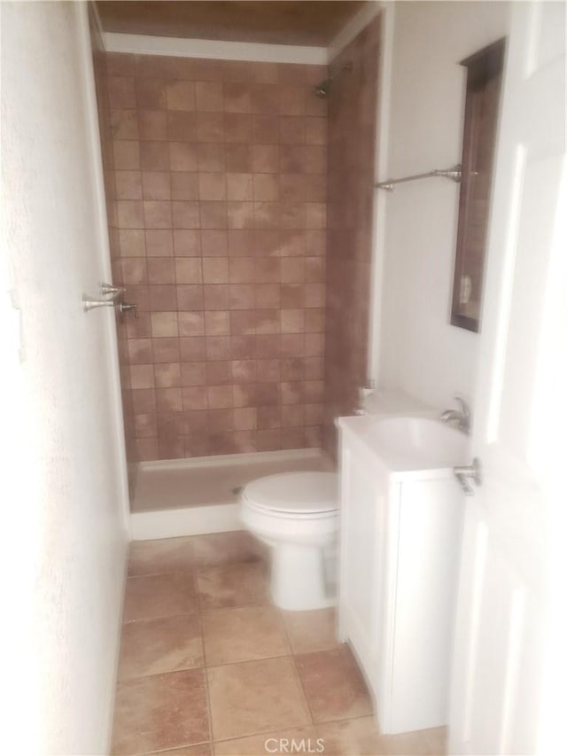 12998 Lakeshore Dr, Clearlake, CA 95422 - bathroom featuring tile patterned floors, vanity, toilet, and a shower stall