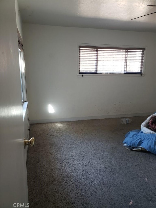 12998 Lakeshore Dr, Clearlake, CA 95422 - unfurnished bedroom with baseboards