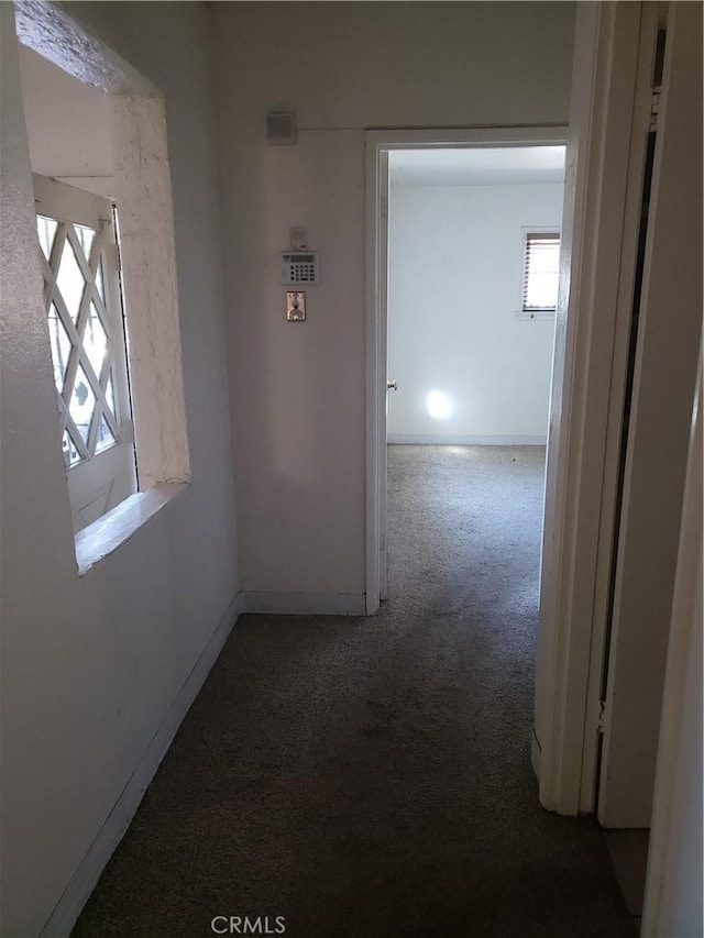 12998 Lakeshore Dr, Clearlake, CA 95422 - hallway with baseboards and carpet floors