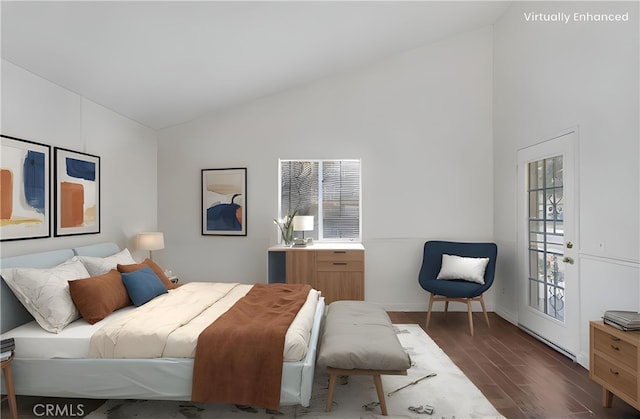 bedroom with multiple windows, dark wood-style flooring, and high vaulted ceiling