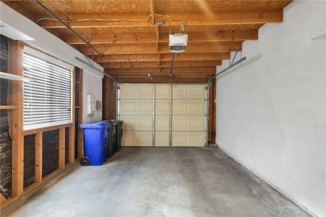 garage featuring a garage door opener