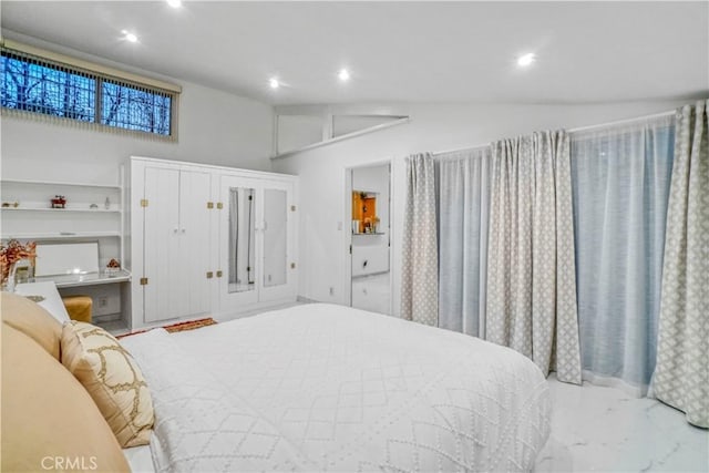 bedroom featuring recessed lighting and lofted ceiling