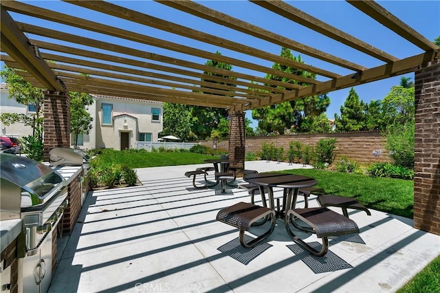 view of patio with outdoor dining space, area for grilling, a pergola, and fence