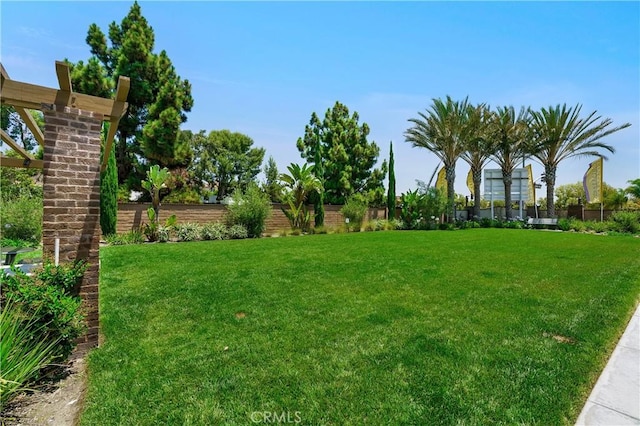 view of yard with fence