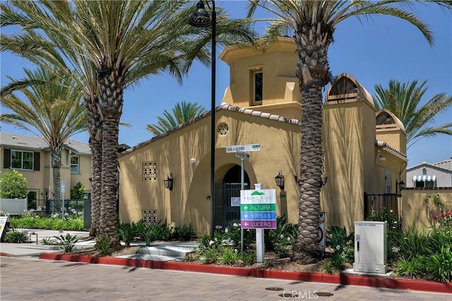 view of property featuring fence