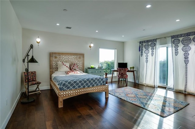 bedroom featuring recessed lighting, visible vents, baseboards, and dark wood-style floors