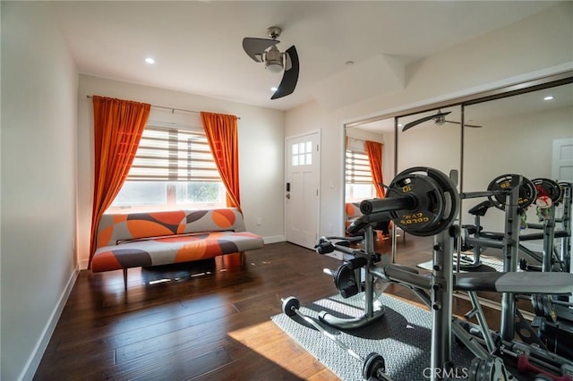 exercise room with recessed lighting, baseboards, wood-type flooring, and ceiling fan