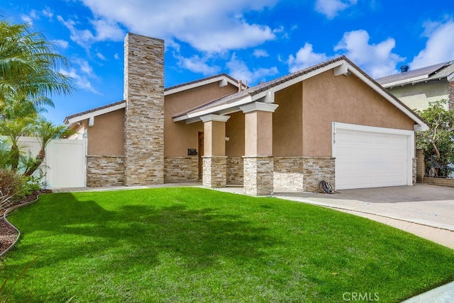 view of front of home featuring concrete driveway, a front yard, stone siding, and stucco siding