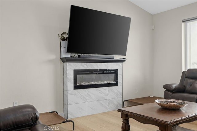 10983 Redwood Ave, Hesperia, CA 92345 - living area featuring a tiled fireplace and wood finished floors
