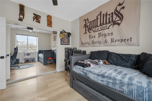 10983 Redwood Ave, Hesperia, CA 92345 - bedroom with wood finished floors, a closet, and a ceiling fan