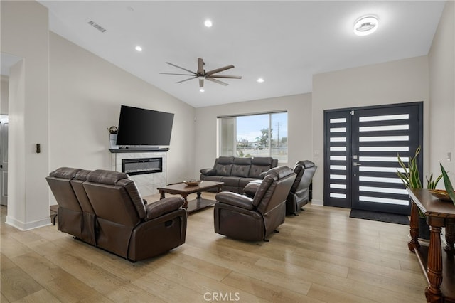 10983 Redwood Ave, Hesperia, CA 92345 - living area featuring light wood-style floors, ceiling fan, a fireplace, lofted ceiling, and recessed lighting