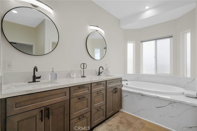 10983 Redwood Ave, Hesperia, CA 92345 - bathroom with double vanity and a garden tub