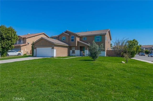 view of front facade featuring stucco siding, driveway, an attached garage, and a front yard