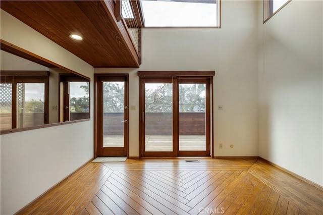 interior space featuring visible vents and wooden ceiling