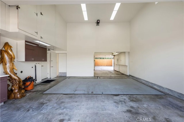 garage with baseboards