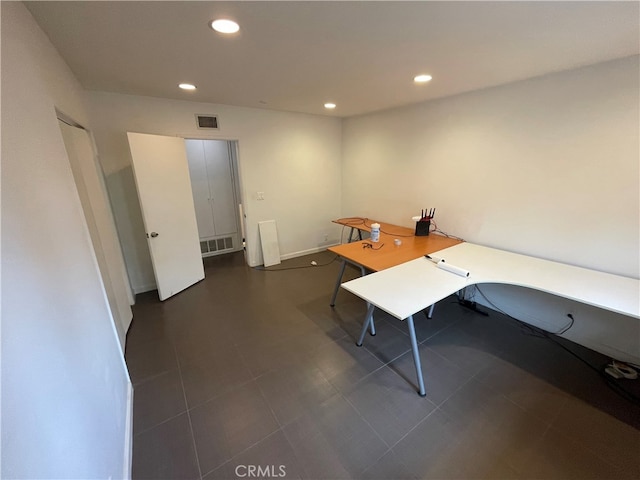 office space featuring recessed lighting and visible vents