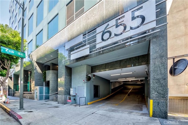 view of building exterior featuring an attached garage