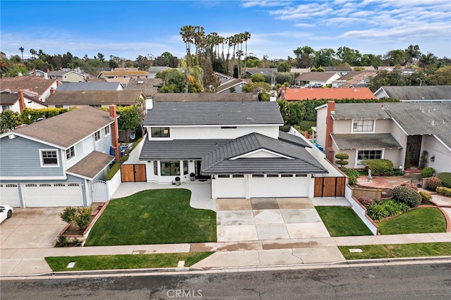 birds eye view of property with a residential view