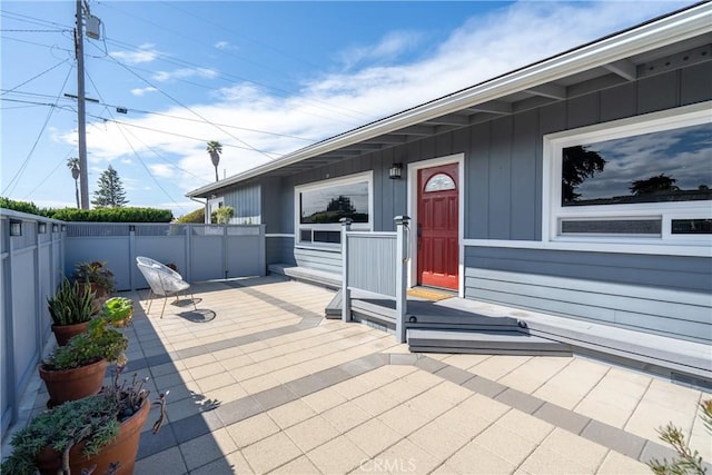 view of patio / terrace featuring fence