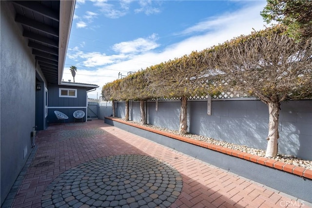 exterior space featuring a patio and a fenced backyard