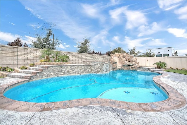 view of pool featuring a fenced in pool and a fenced backyard