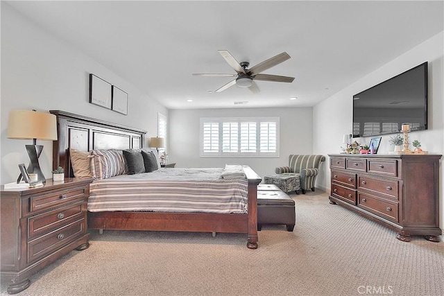 bedroom with recessed lighting, a ceiling fan, visible vents, and light carpet