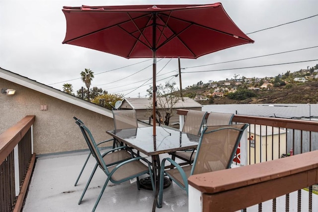 exterior space with outdoor dining area