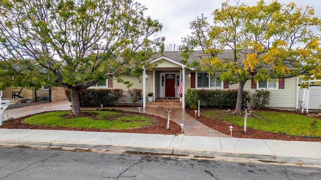 view of front of property with a front lawn