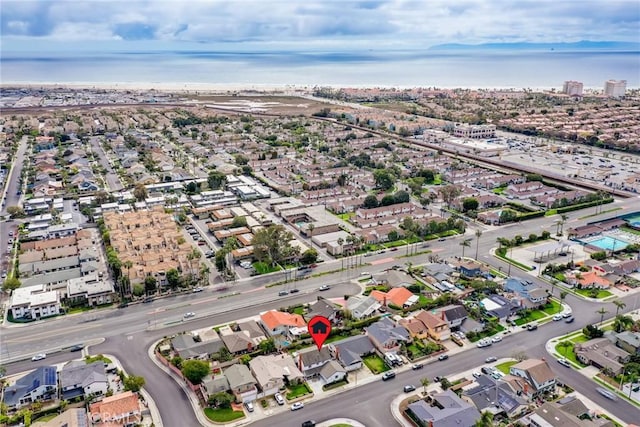 birds eye view of property with a residential view