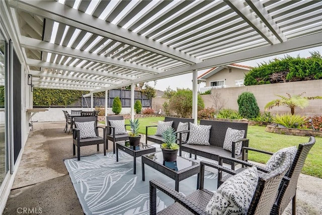 view of patio / terrace with outdoor lounge area, a fenced backyard, and a pergola