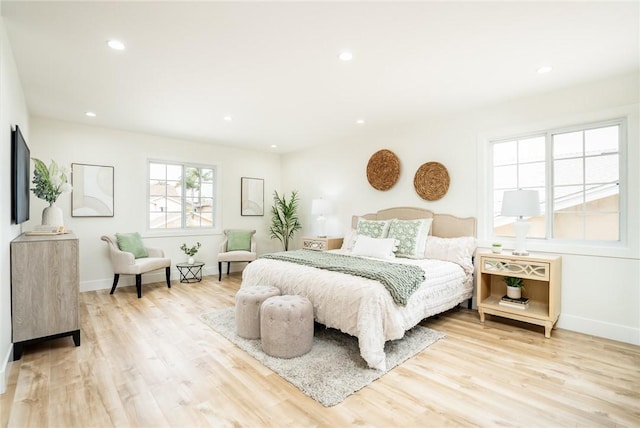 bedroom with light wood-style flooring, recessed lighting, and baseboards