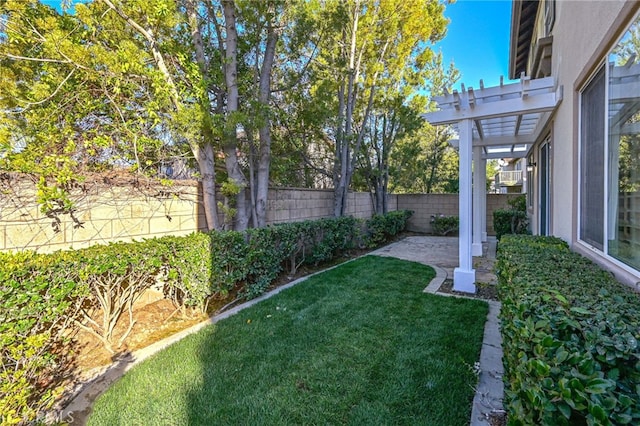 view of yard featuring a patio, fence, and a pergola