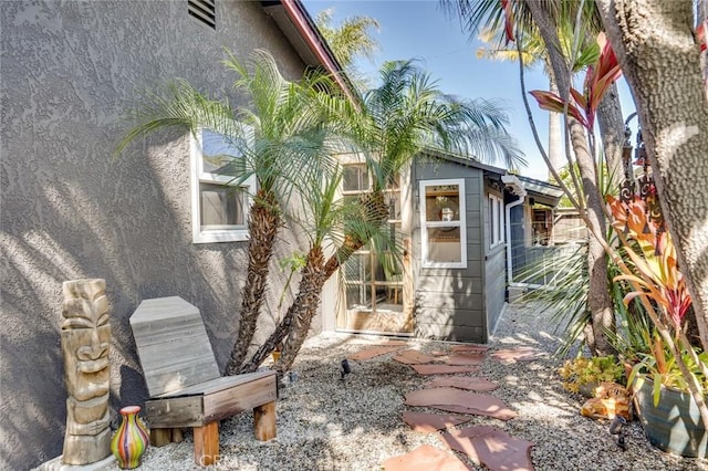 exterior space featuring stucco siding